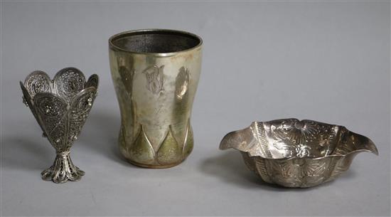A German 835 silver beaker monogrammed RU, a German silver shaped oval small bowl and a filigree zarf.